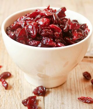 Dried cranberries placed in a bowl,sweet dehydrated fruits